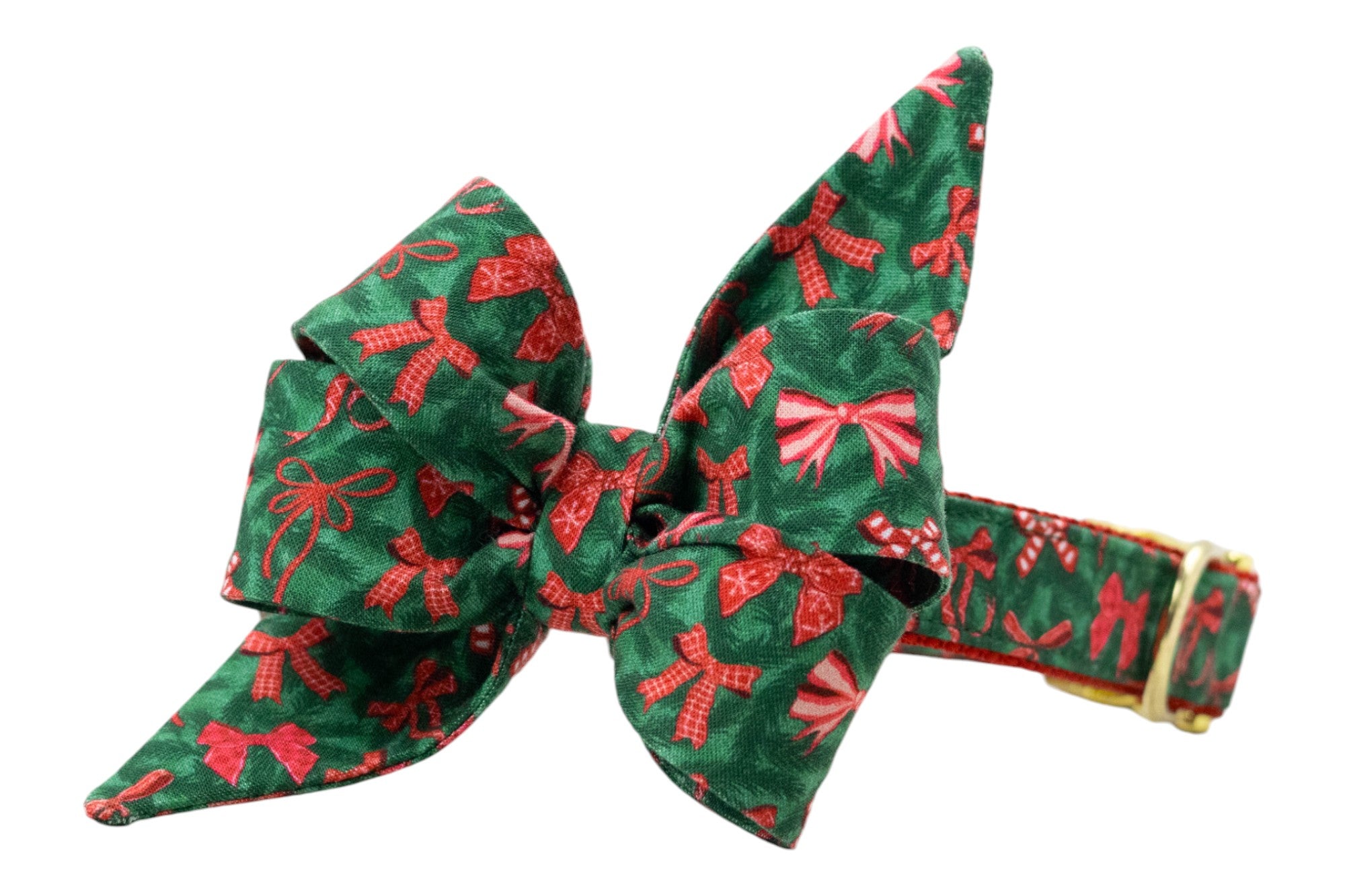 Festive dog collar with an oversized belle bow attachment, made from green fabric decorated with bows, candy canes, and holiday ribbon patterns. The belle bow is large and structured for a decorative touch. The collar includes adjustable hardware.