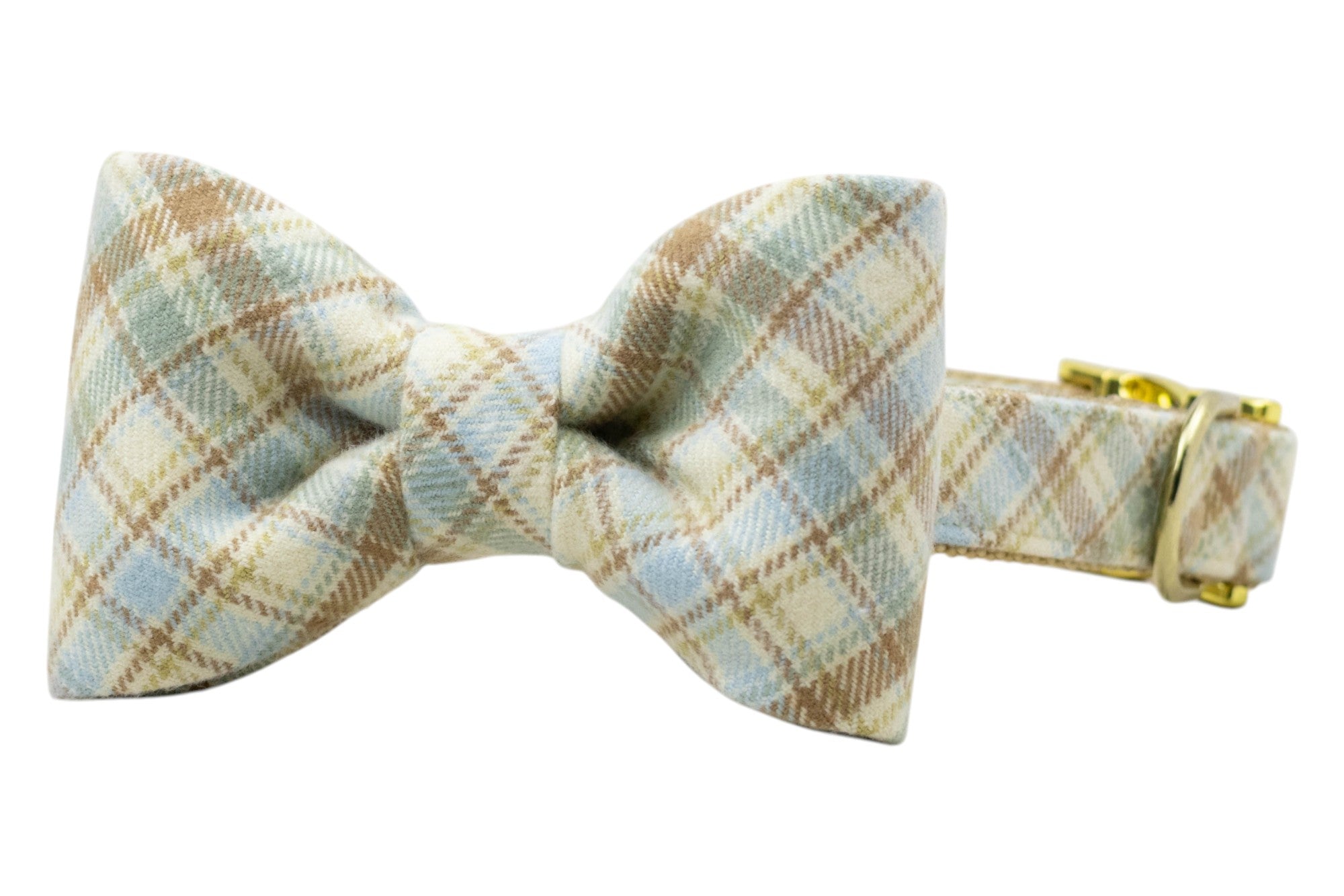 A perfectly preppy dog bow tie collar in soft flannel plaid, featuring calming fall hues—topped with gleaming hardware.