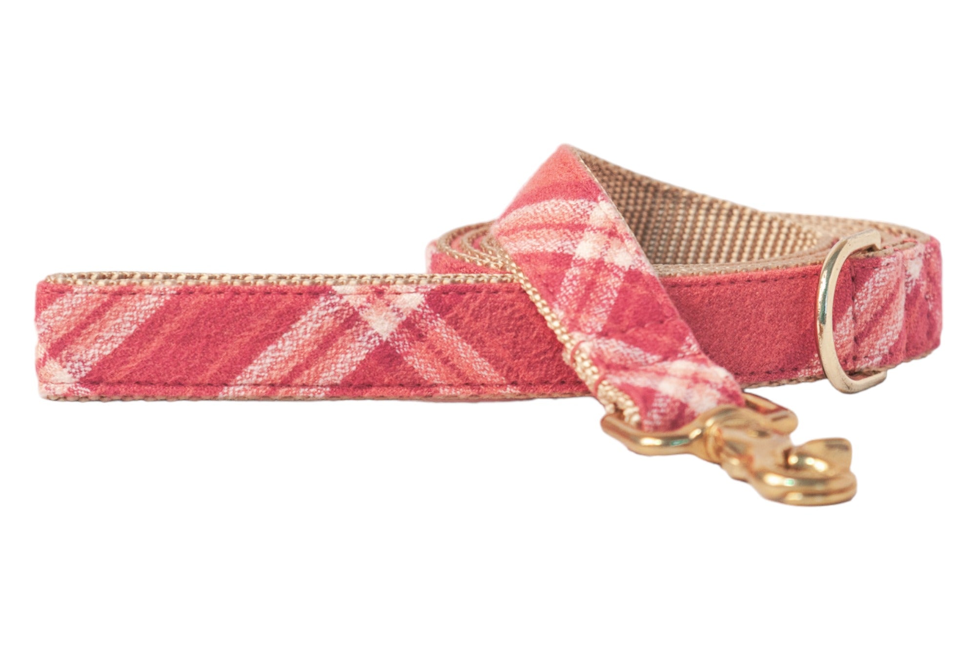 A leash that feels as good as it looks! Crafted from soft pink flannel in a playful plaid, this lead is both cute and cozy, with luxe hardware that adds just the right shine.