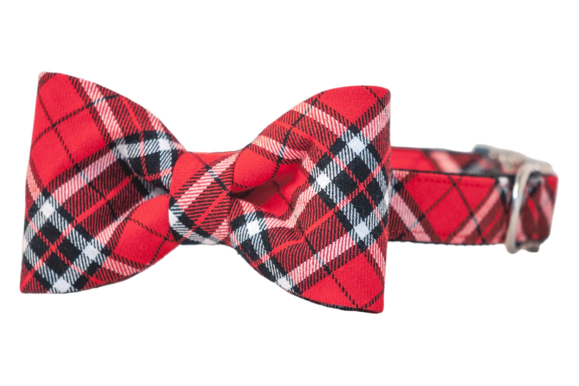 Dog collar with attached red tartan bow tie, featuring a festive black and white plaid pattern, structured bow shape, and silver metal hardware—perfect for holiday parties and dapper winter looks.