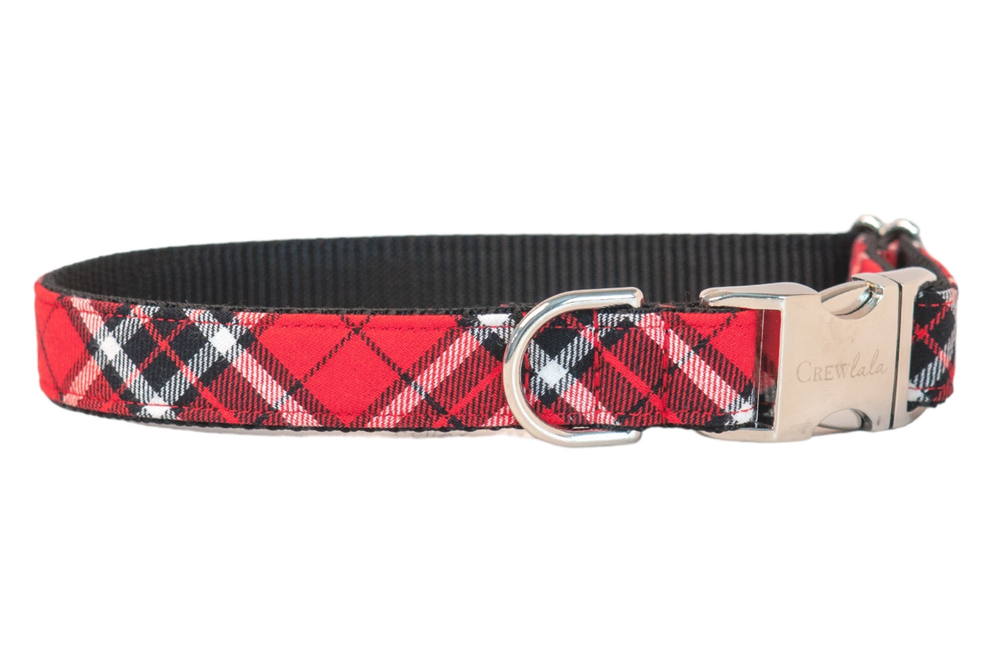 Classic red plaid dog collar featuring a traditional tartan pattern in black and white, with sturdy black webbing backing, a buckle engraved with “Crewlala,” and a matching metal D-ring.